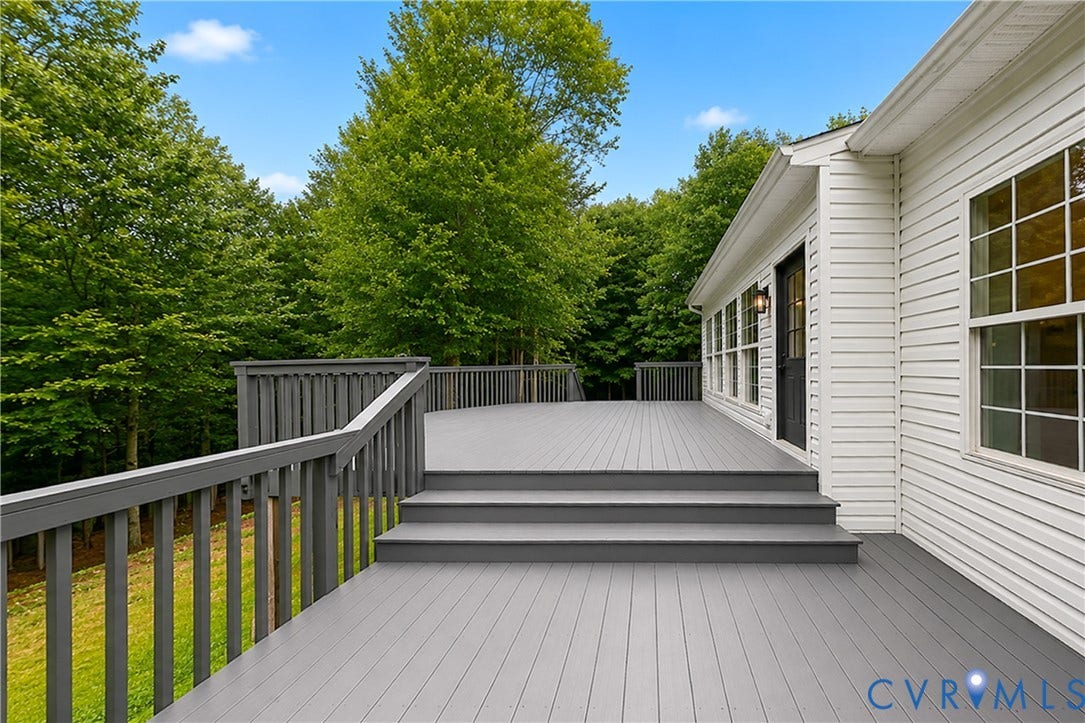 3929 Meadowview Lane, Richmond, VA 23223 Expansive deck with gray composite decking and matching railings