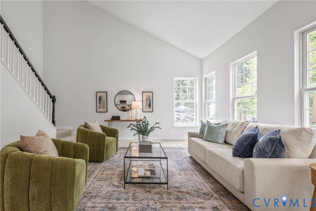 3929 Meadowview Lane, Richmond, VA 23223 Vaulted ceilings, multiple windows, and a staircase with an open baluster design