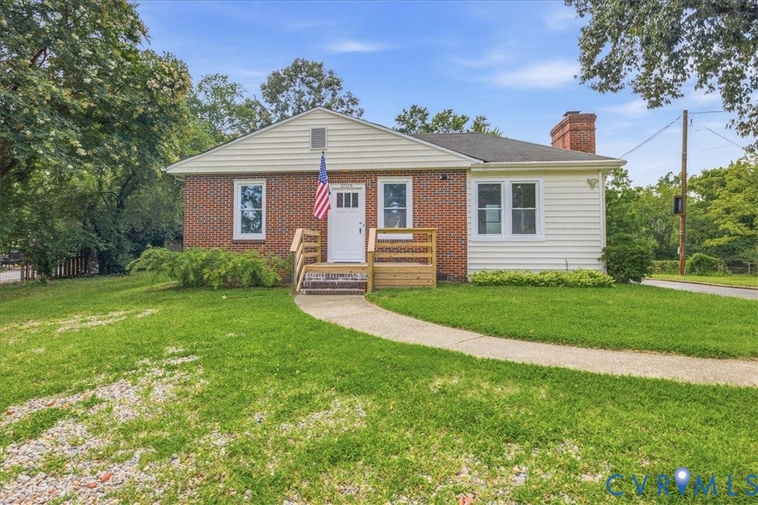 7232 Hopkins Road, North Chesterfield, VA 23237 Brick and siding exterior with a prominent chimney