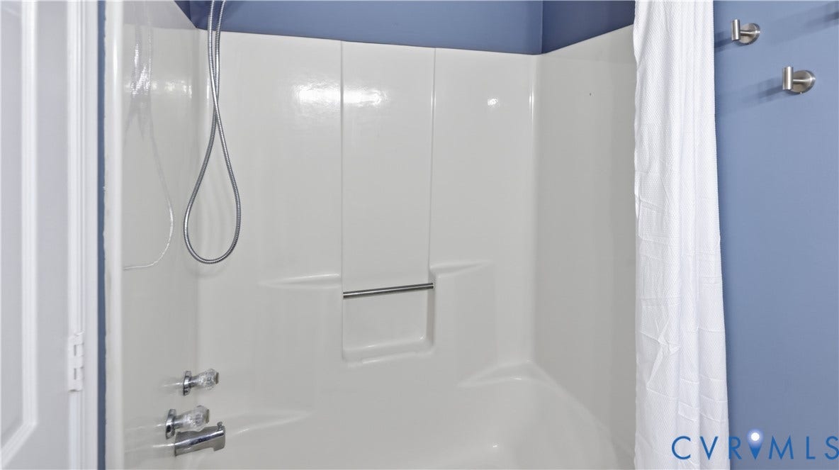 Integrated shower and tub combination featuring chrome fixtures