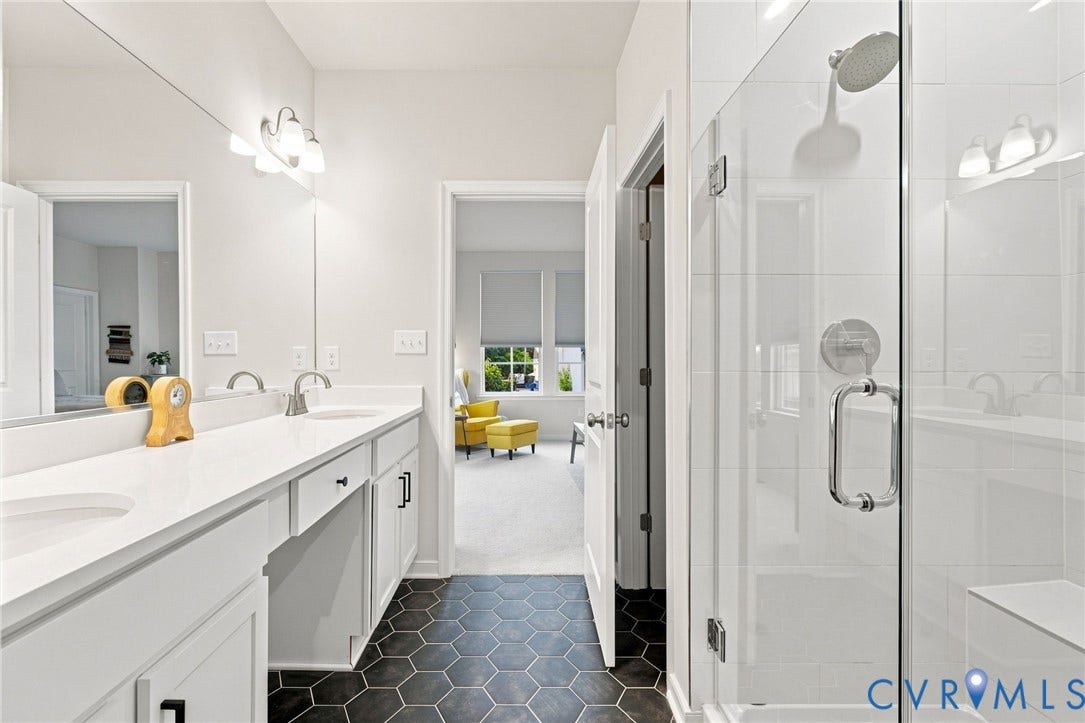 2445 Ownby Lane, #B15, Greater Scott's Addition, Richmond, VA 23220 Dual vanity with white countertops and brushed nickel faucets