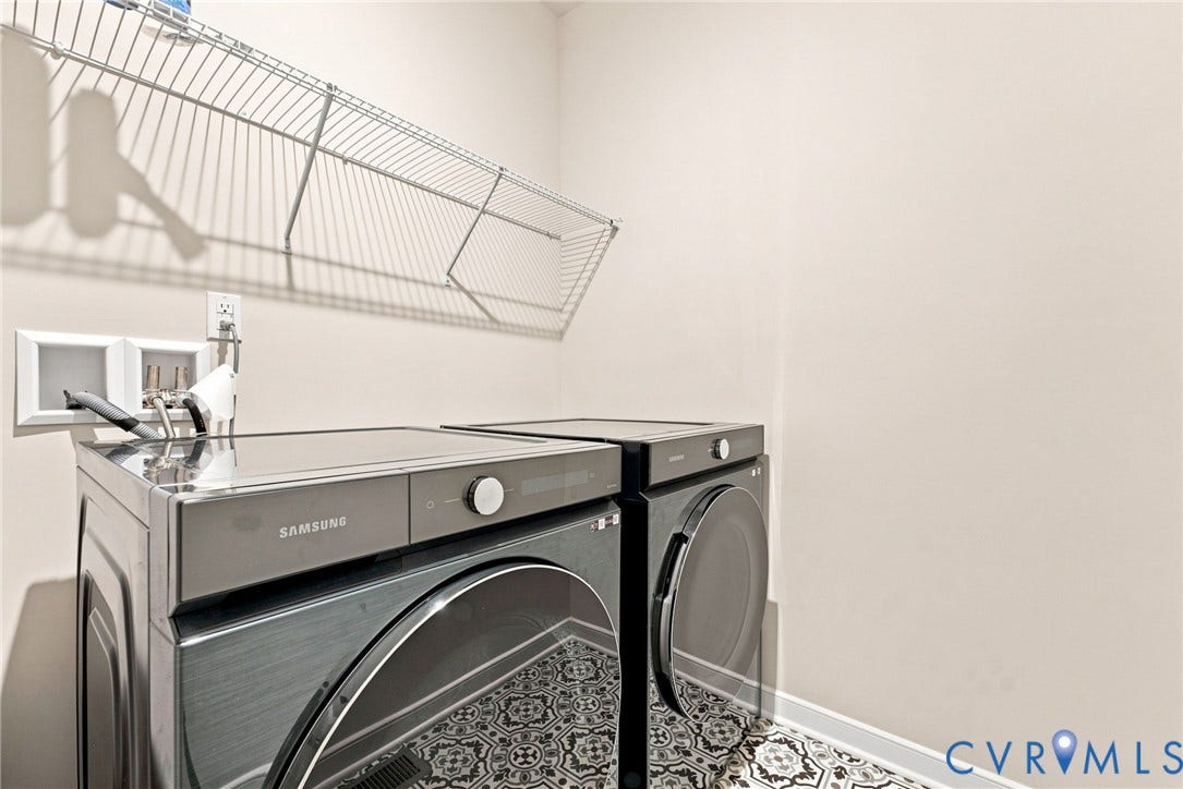 2445 Ownby Lane, #B15, Greater Scott's Addition, Richmond, VA 23220 Utility room with patterned floor tile and wire shelving