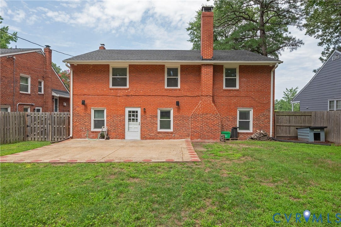 5709 Monument Avenue, Richmond, VA 23226 Red brick exterior with a large concrete patio