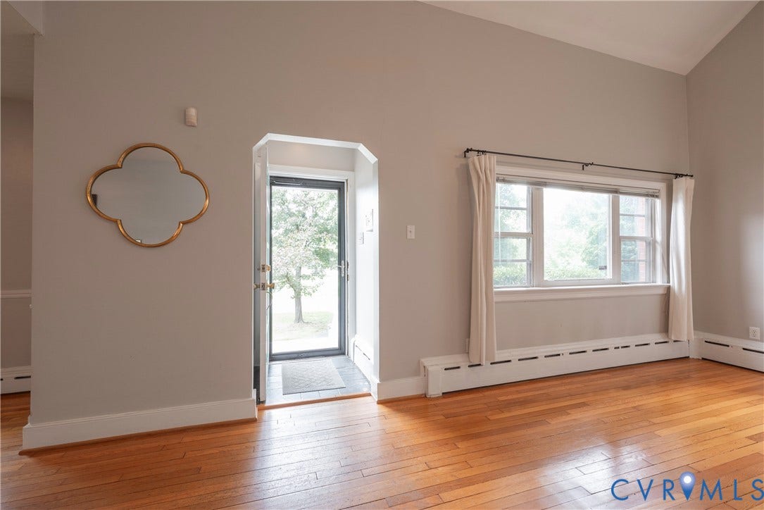 5709 Monument Avenue, Richmond, VA 23226 Living Room off the entrance with a cathedral ceiling with fans/lights
