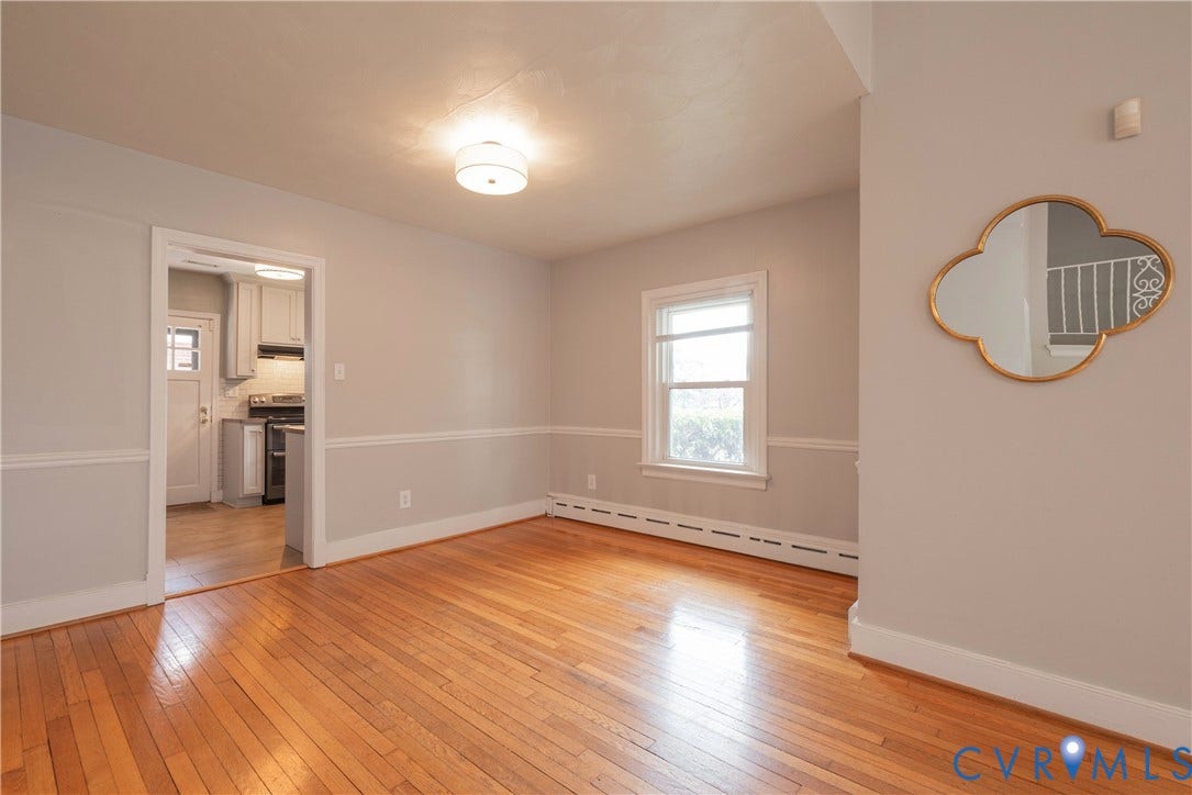5709 Monument Avenue, Richmond, VA 23226 Dining Room with chair rail molding, decorative lighting