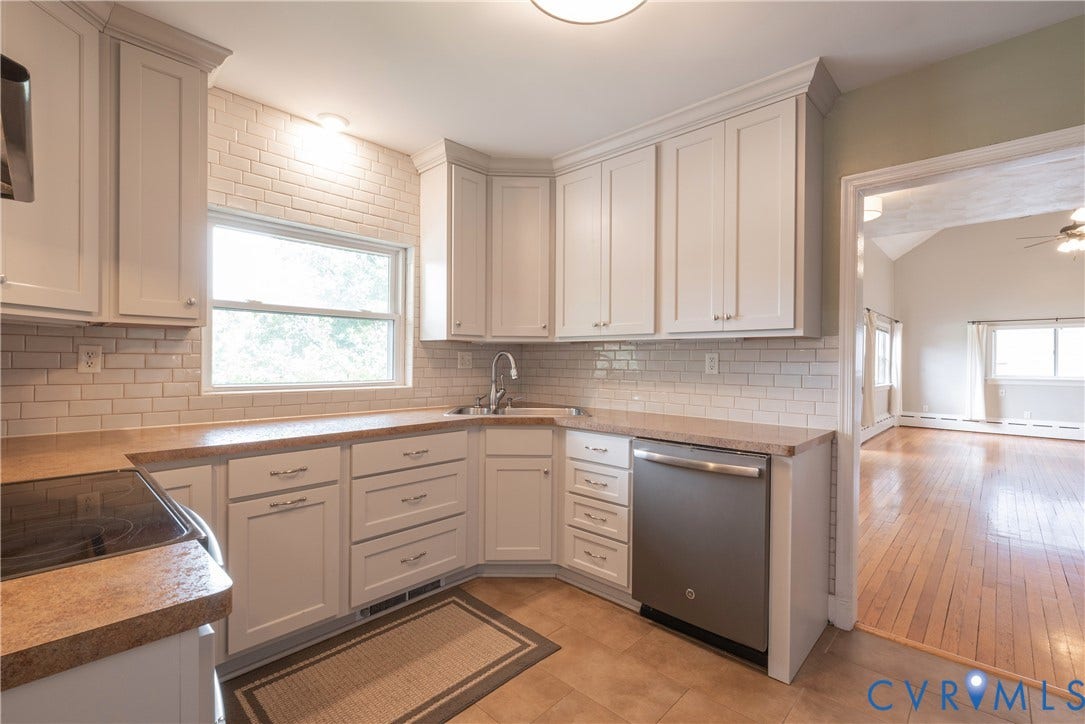 5709 Monument Avenue, Richmond, VA 23226 Kitchen featuring Shaker cabinetry, subway tile backsplash, stainless steel dishwasher, and a built-in range, lots of natural light