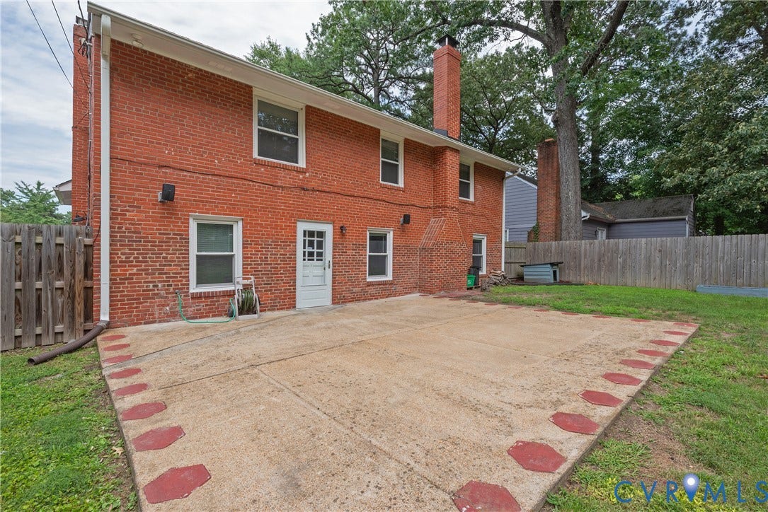 5709 Monument Avenue, Richmond, VA 23226 Patio - an expansive concrete patio featuring decorative red stepping stones great for cookouts friendly gatherings
