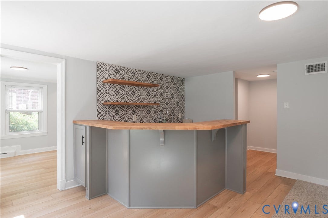 5709 Monument Avenue, Richmond, VA 23226 Rec Room - bar - with ample seating area and opens to the office/4th bedroom