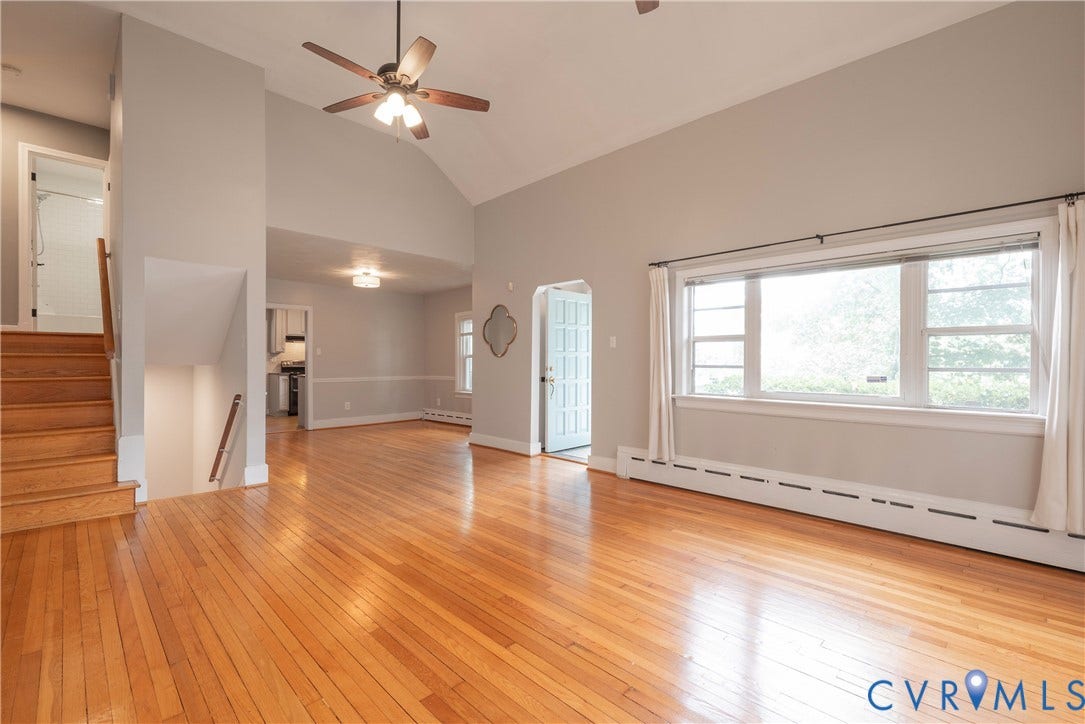 5709 Monument Avenue, Richmond, VA 23226 Living Room with easy access to all the main level rooms and quick access to the bedrooms above