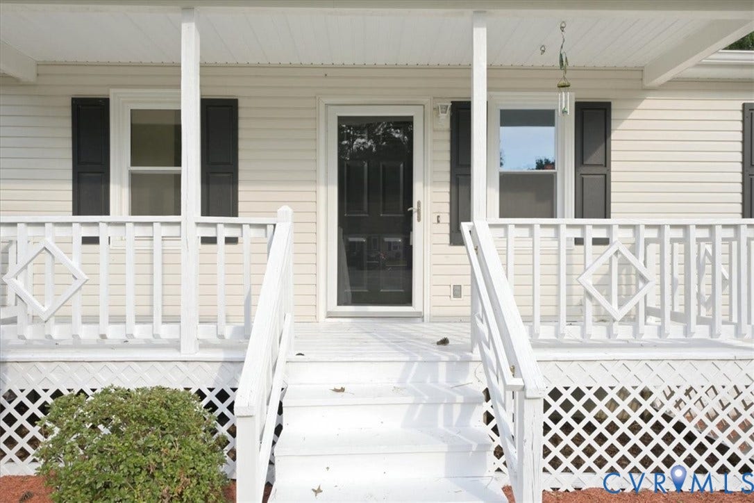 21103 Rabbit Run, Chesterfield, VA 23803 Inviting front porch with white railings, steps, and latticework