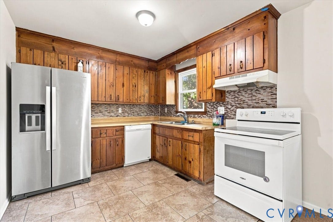 21103 Rabbit Run, Chesterfield, VA 23803 Kitchen featuring wood cabinetry, stainless steel side-by-side refrigerator, white built-in dishwasher, white electric range, and tiled flooring