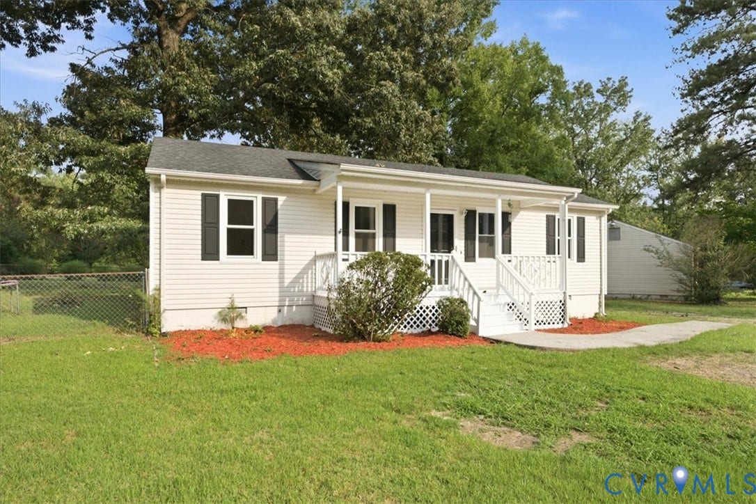 21103 Rabbit Run, Chesterfield, VA 23803 White siding exterior with a covered front porch featuring white railings