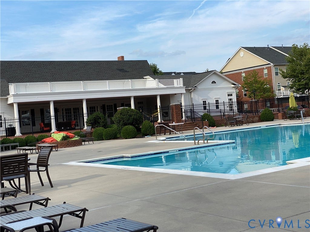 1901 Liesfeld Parkway, West Broad Village, Glen Allen, VA 23060 Expansive outdoor pool with integrated steps, surrounded by a concrete patio