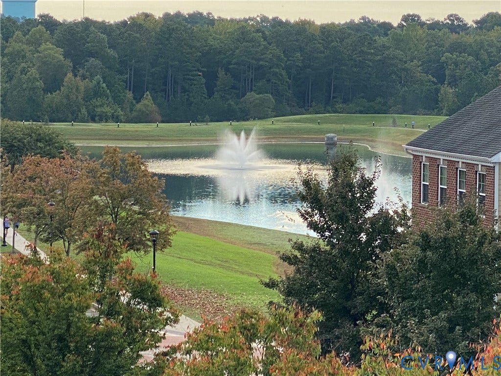 1901 Liesfeld Parkway, West Broad Village, Glen Allen, VA 23060 Pond with a central fountain, surrounded by manicured green space, and mature trees