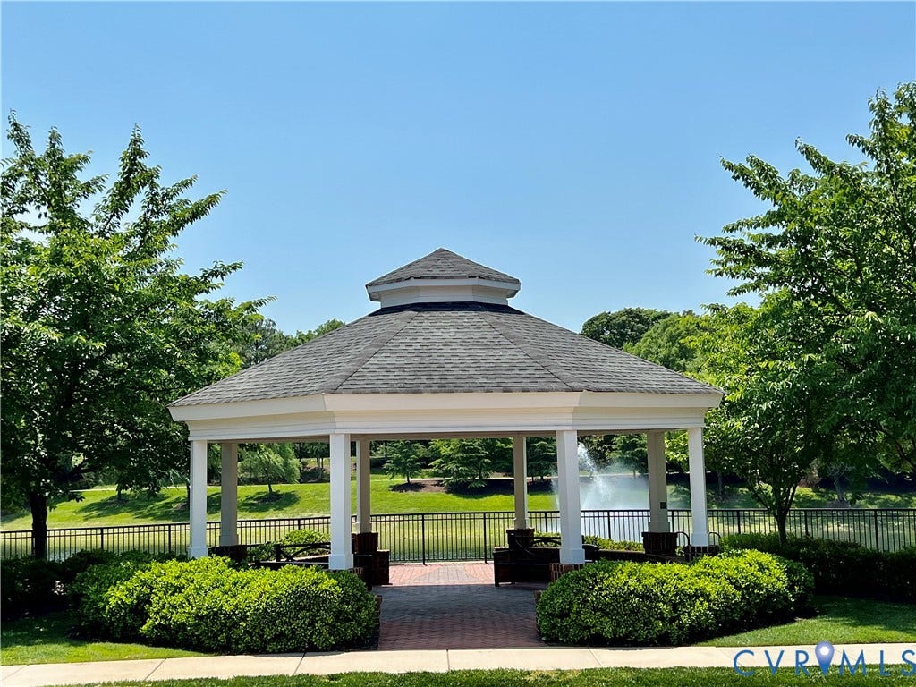 1901 Liesfeld Parkway, West Broad Village, Glen Allen, VA 23060 Open-air gazebo with a shingled roof and white columns, featuring a brick paver base