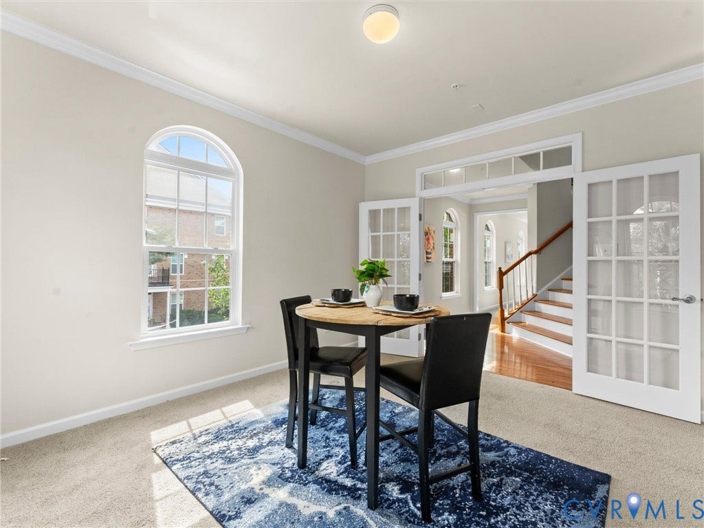 1901 Liesfeld Parkway, West Broad Village, Glen Allen, VA 23060 Arch-top window with grid inserts, crown molding, double French doors, and ceiling-mounted light fixture