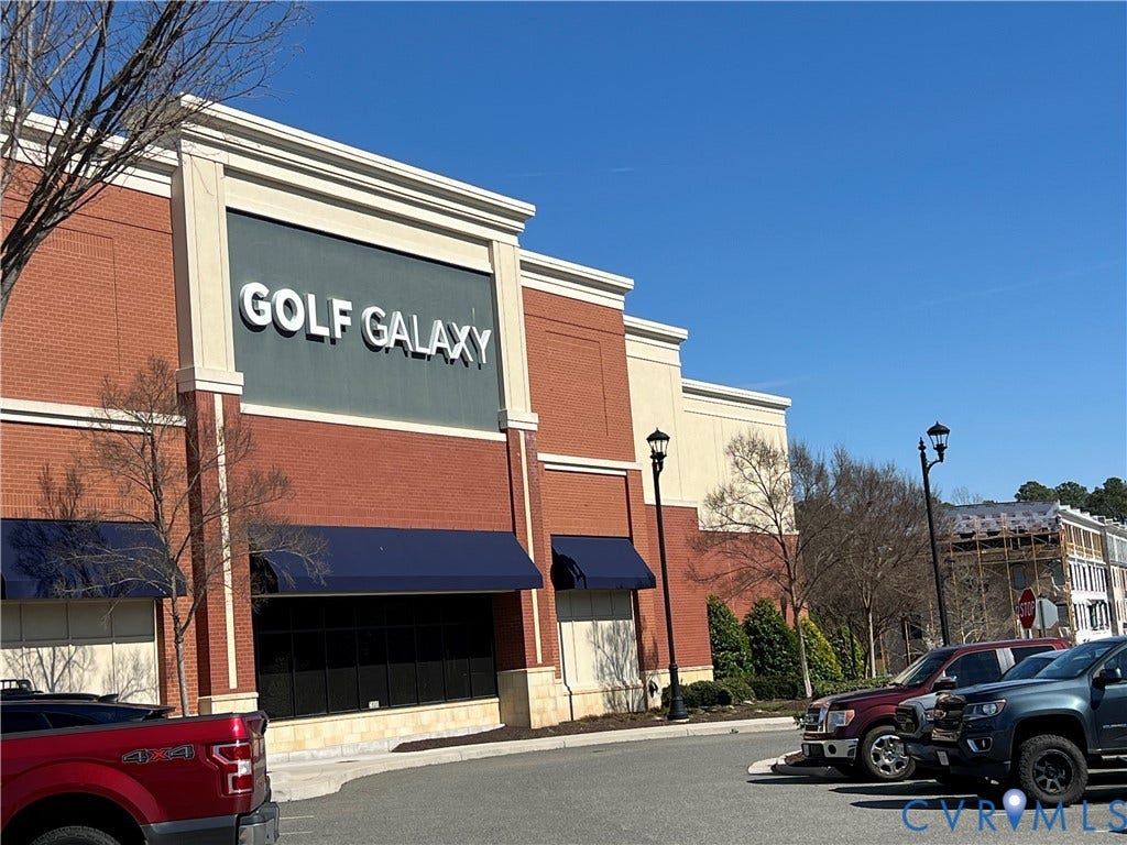 1901 Liesfeld Parkway, West Broad Village, Glen Allen, VA 23060 Red brick facade with stone-look accents and blue awnings