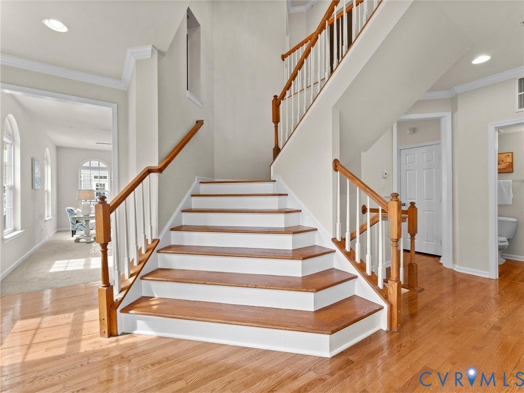 1901 Liesfeld Parkway, West Broad Village, Glen Allen, VA 23060 Hardwood flooring, wood stair treads, white risers, wood handrails, and white balusters