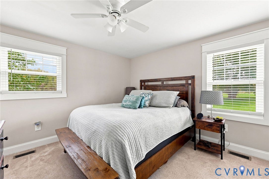 1108 Schroeder Road, Powhatan, VA 23139 Recessed lighting, ceiling fan, and two windows with blinds