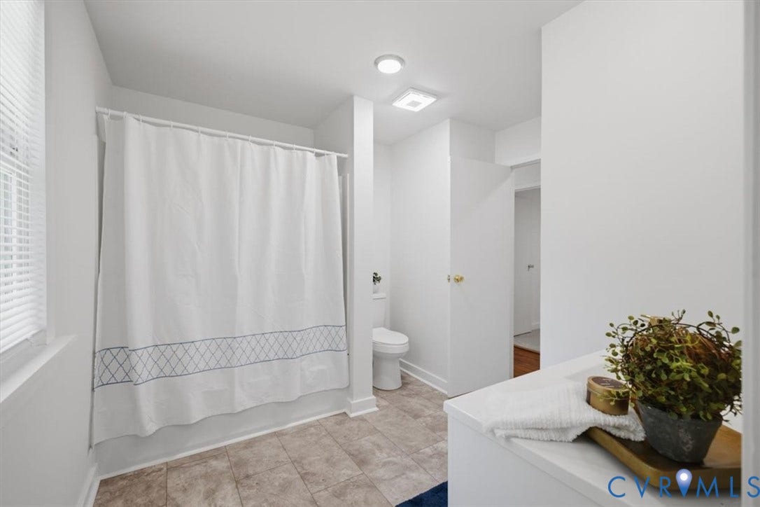 2338 Georges Road, Powhatan, VA 23139 Full bathroom with tiled flooring, a shower-tub combination, and a single window