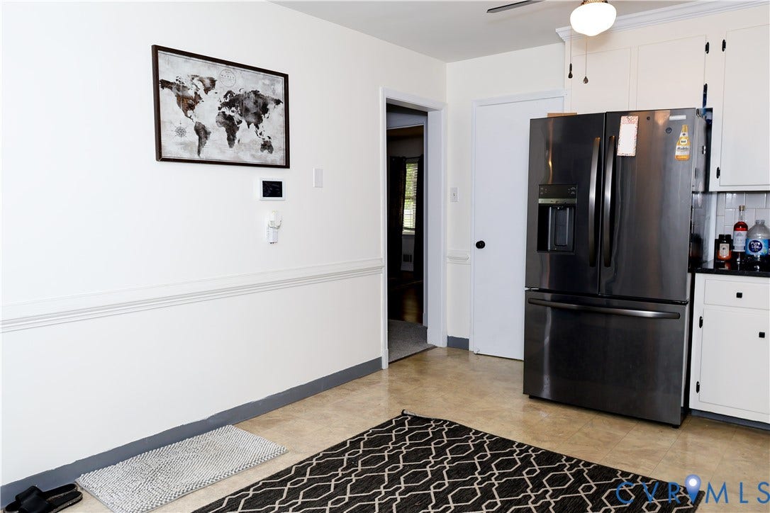 4941 Hopkins Road, Chesterfield, VA 23234 Laminate flooring, white cabinetry, granite countertop,