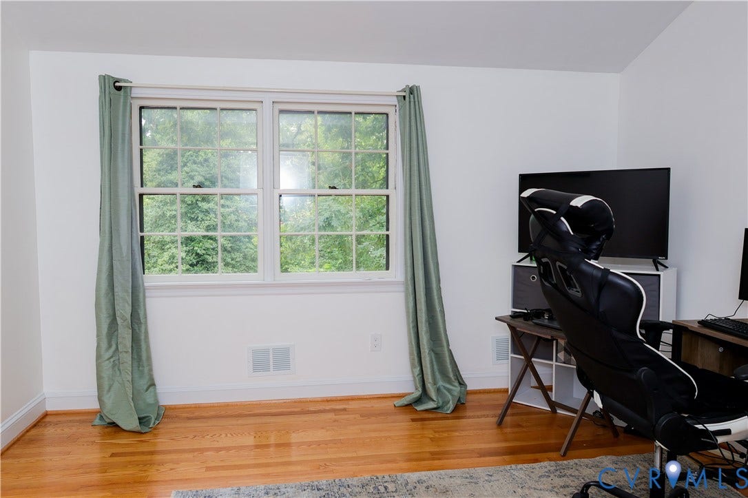 4941 Hopkins Road, Chesterfield, VA 23234 Third bedroom or office w/ Hardwood flooring and a double-hung window with grilles