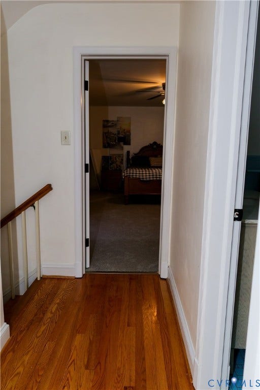 4941 Hopkins Road, Chesterfield, VA 23234 Second floor landing w/ Wood-finish flooring with a wood handrail