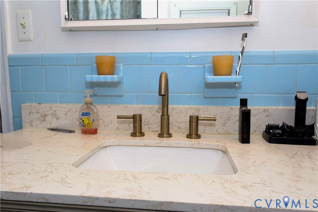 4941 Hopkins Road, Chesterfield, VA 23234 Integrated rectangular sink with a light-toned countertop.