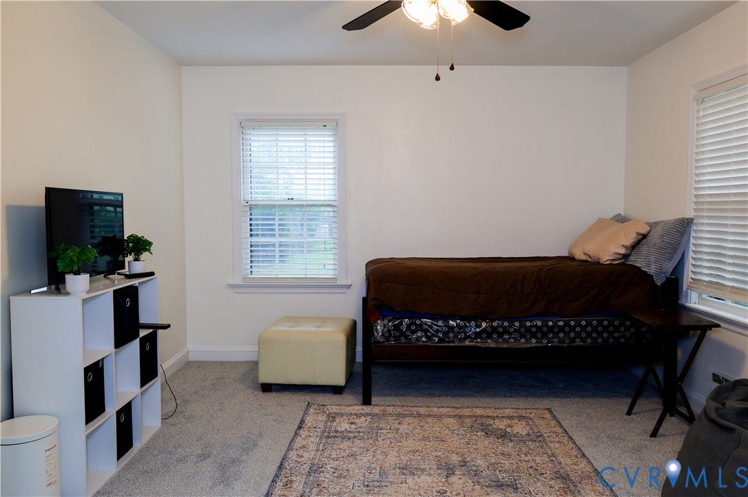 4941 Hopkins Road, Chesterfield, VA 23234 Downstairs Bedroom 1, ceiling fan with light fixture, carpet flooring