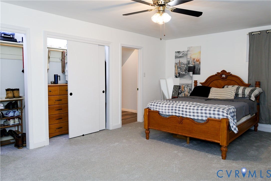 4941 Hopkins Road, Chesterfield, VA 23234 Built-in ceiling fan with light fixture, light, carpeting, and a closet with sliding doors