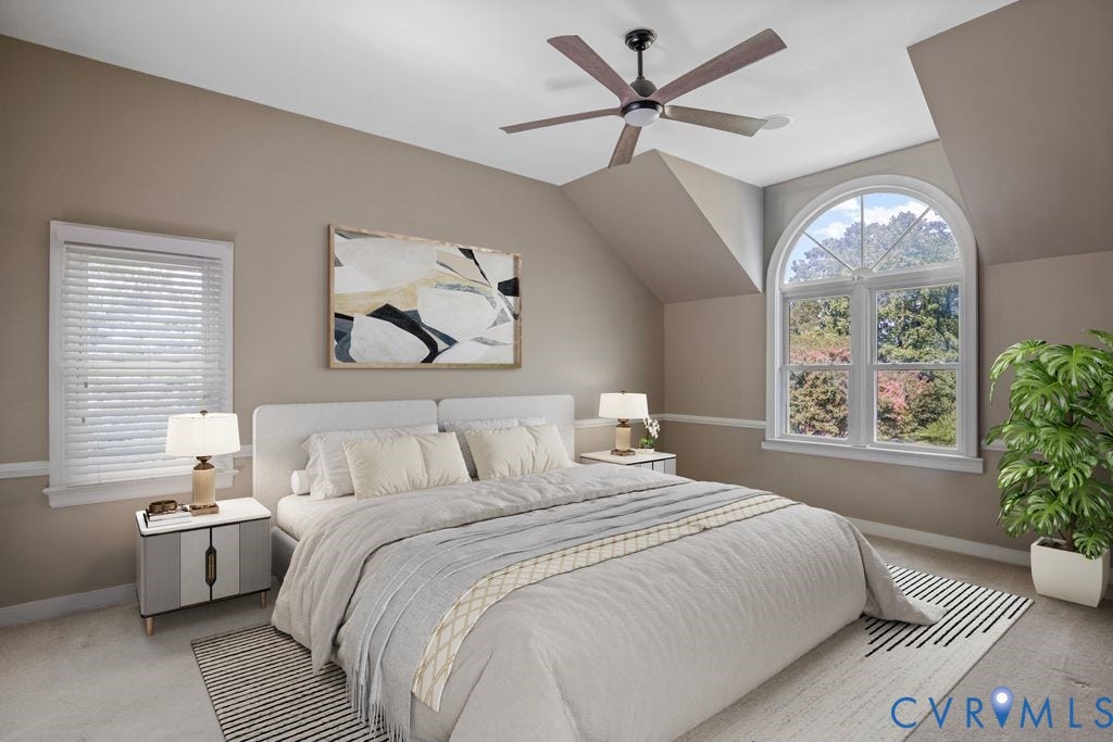 8806 Thornton Heath Drive, Chesterfield, VA 23832 Arched window, second window with blinds, ceiling fan, neutral wall tones, and carpeted flooring