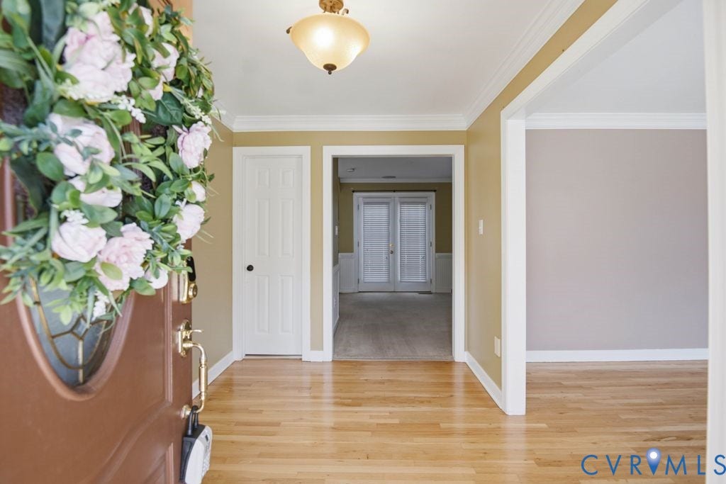 8806 Thornton Heath Drive, Chesterfield, VA 23832 Wood-finish flooring, crown molding, and recessed lighting
