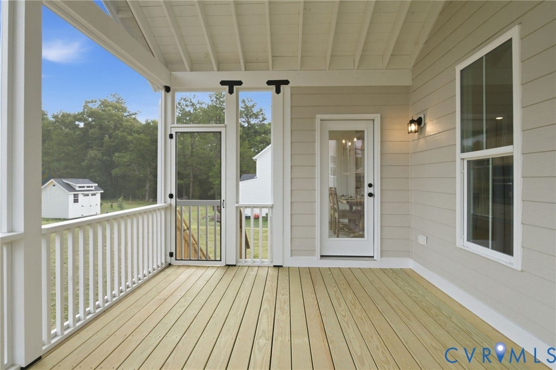 Rear Screened Porch -Photo represents the actual home