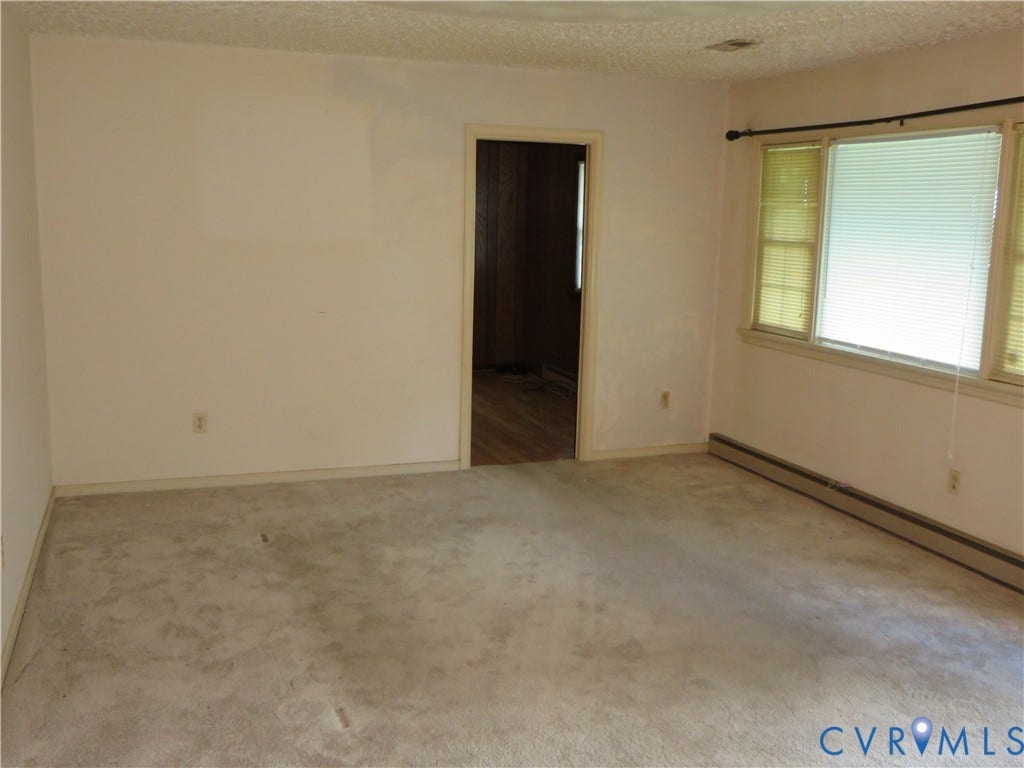 3107 Neale Street, Eastern Henrico, Richmond, VA 23223 Carpeted flooring, white walls, baseboard heating, and window treatments