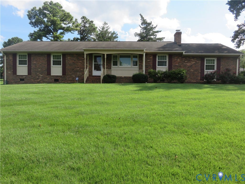 3107 Neale Street, Eastern Henrico, Richmond, VA 23223 Brick exterior with a covered front entry and a prominent brick chimney