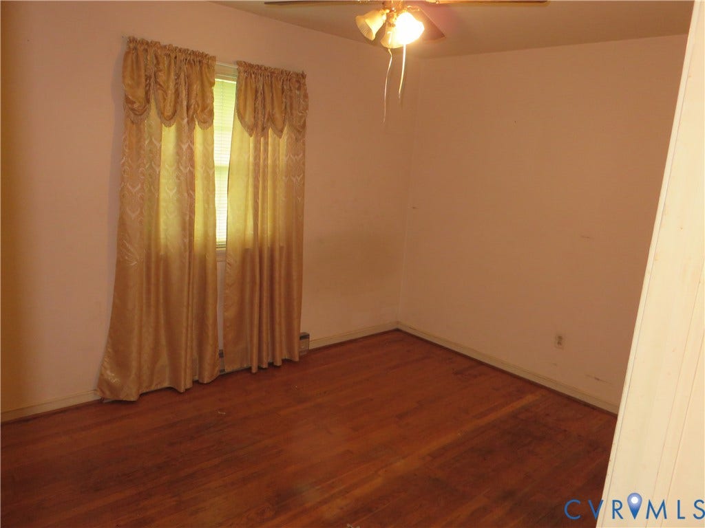 3107 Neale Street, Eastern Henrico, Richmond, VA 23223 Wood-finish flooring with baseboard trim