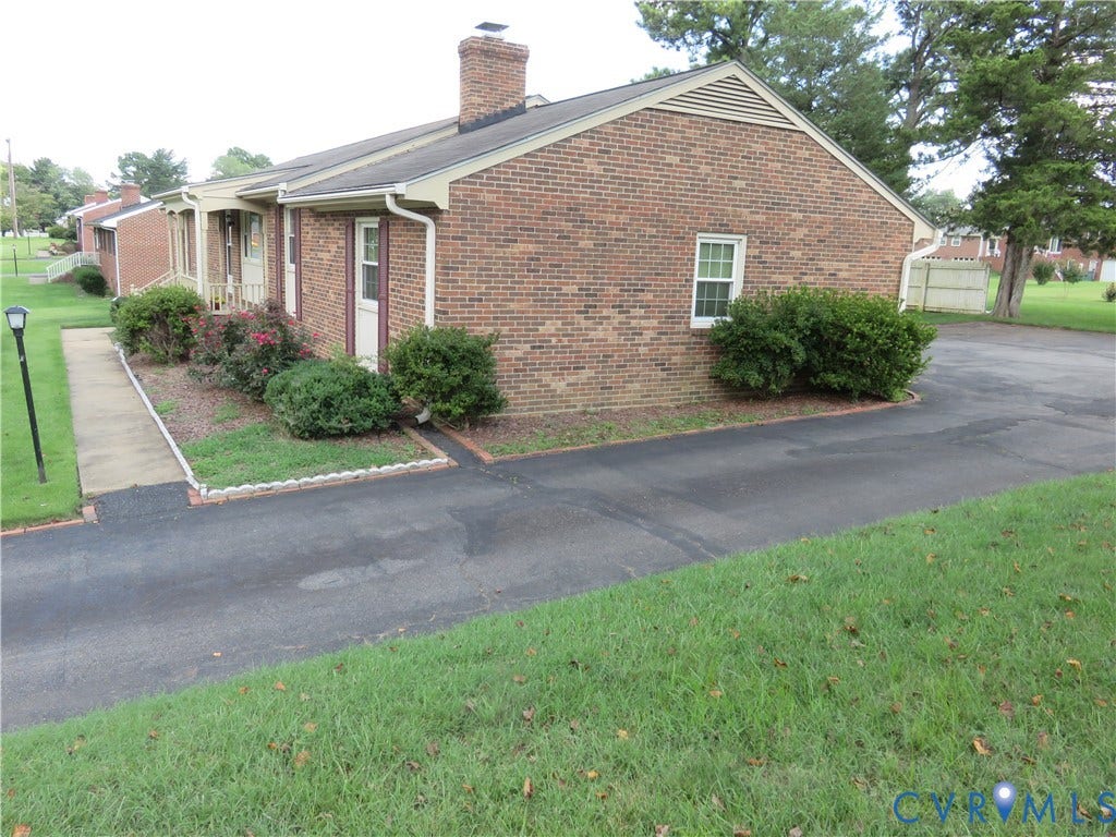 3107 Neale Street, Eastern Henrico, Richmond, VA 23223 Brick exterior with a chimney