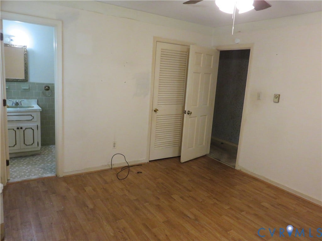 3107 Neale Street, Eastern Henrico, Richmond, VA 23223 Wood-finish flooring with white walls and a ceiling fan