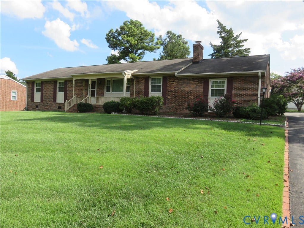 3107 Neale Street, Eastern Henrico, Richmond, VA 23223 Brick exterior with white window trim and dark shutters