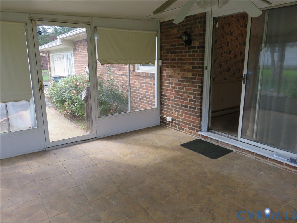 3107 Neale Street, Eastern Henrico, Richmond, VA 23223 Enclosed sunroom featuring tile flooring and a ceiling fan