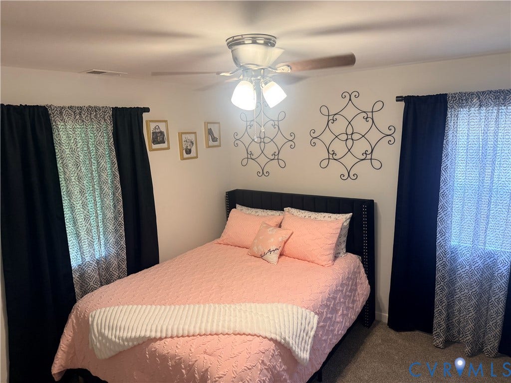 1826 Claiborne Street, Byrd Park, Richmond, VA 23220 Recessed ceiling fan with integrated lighting, wall-to-wall carpeting, and window treatments with dark blackout drapes and sheer patterned curtains