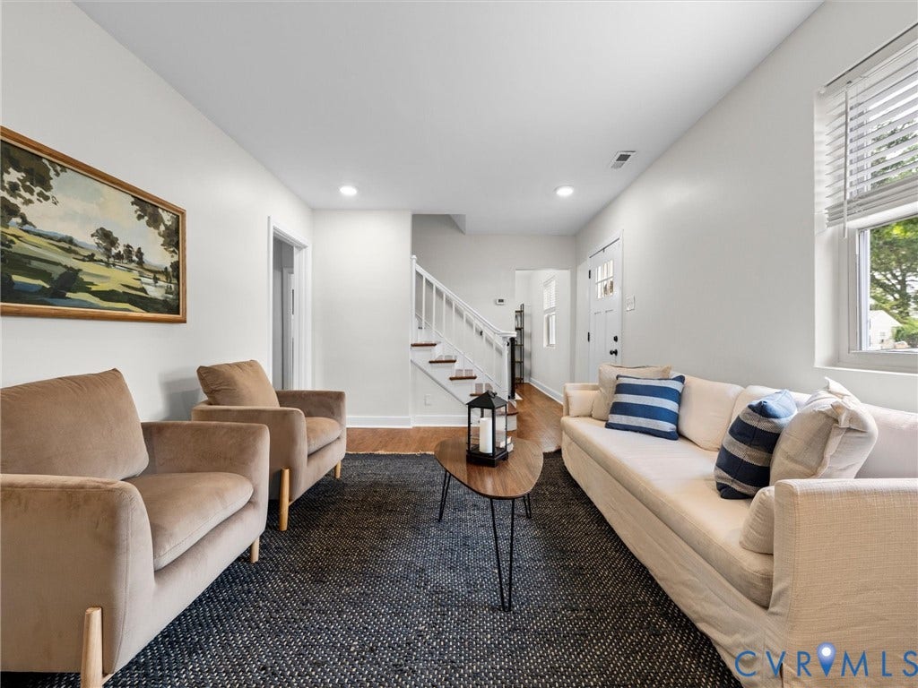 709 Ratcliffe Avenue, Richmond, VA 23222 Hardwood-style flooring, white painted staircase, recessed lighting, and a window with blinds