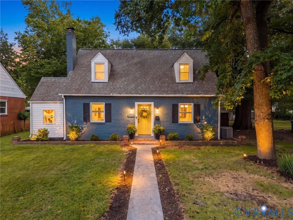 709 Ratcliffe Avenue, Richmond, VA 23222 Brick and siding exterior with a shingle roof, dormer windows, and a concrete walkway