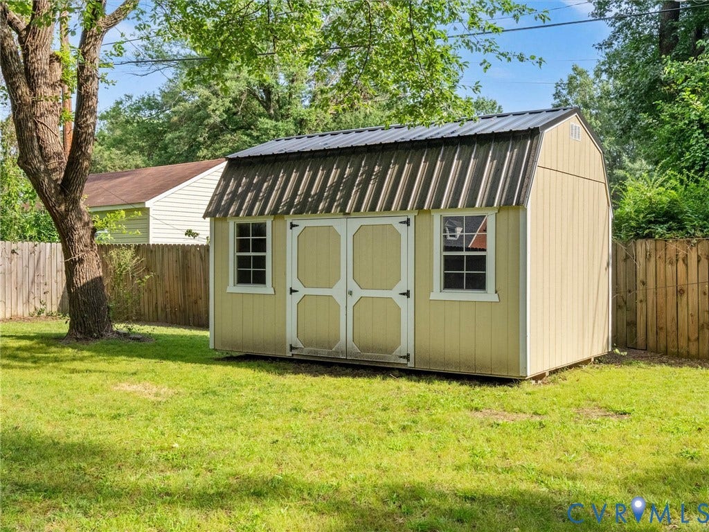 709 Ratcliffe Avenue, Richmond, VA 23222 Backyard storage shed featuring a gambrel roof and double entry doors