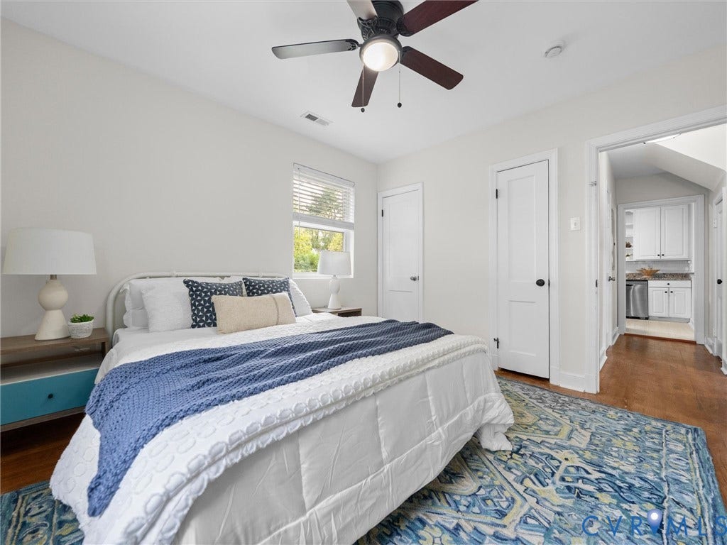 709 Ratcliffe Avenue, Richmond, VA 23222 Wood-finish flooring throughout, white walls, and a ceiling fan with integrated lighting