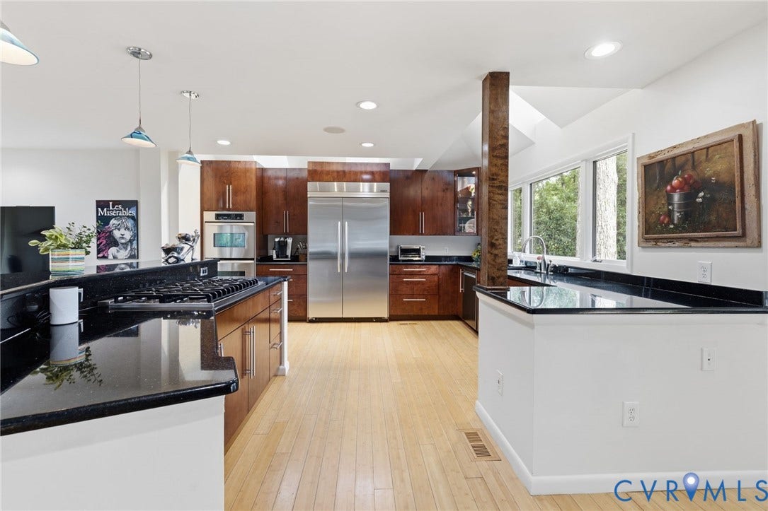 3416 Walkers Ferry Road, Walkers Ferry, Midlothian, VA 23112 Kitchen featuring wood cabinetry, stainless steel appliances, black countertops, wood-finish flooring, and recessed lighting