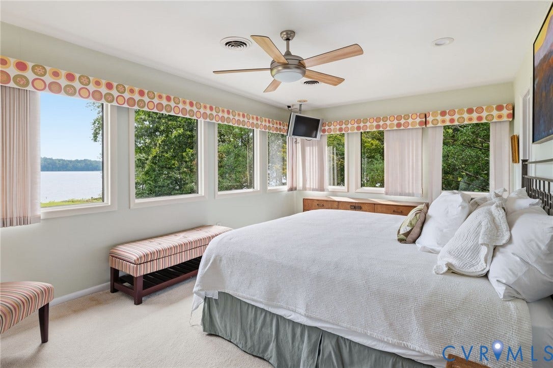 3416 Walkers Ferry Road, Walkers Ferry, Midlothian, VA 23112 Lakefront windows, wood-finish ceiling fan, recessed lighting, wall-mounted television, built-in wooden cabinetry