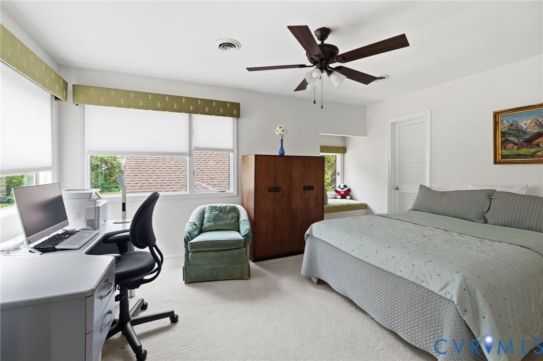3416 Walkers Ferry Road, Walkers Ferry, Midlothian, VA 23112 White walls, light-colored carpeting, multiple windows, a ceiling fan with integrated lighting, and a window seat
