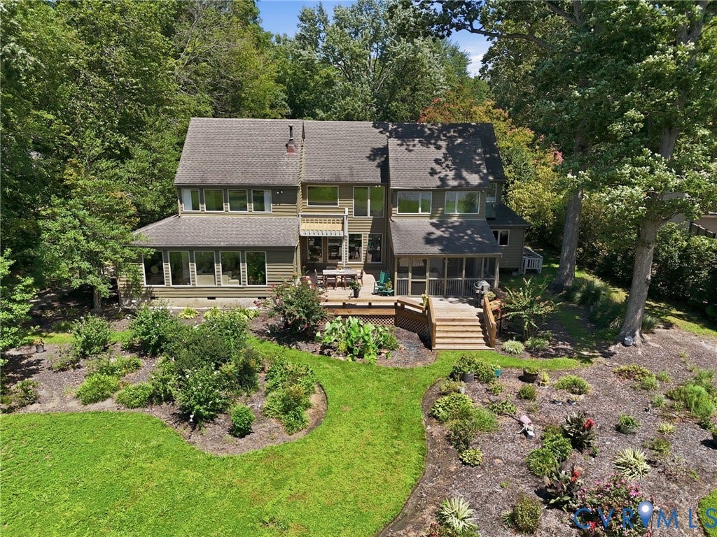 3416 Walkers Ferry Road, Walkers Ferry, Midlothian, VA 23112 Multi-level dwelling with a screened porch, a sunroom with multiple windows, and an exterior deck
