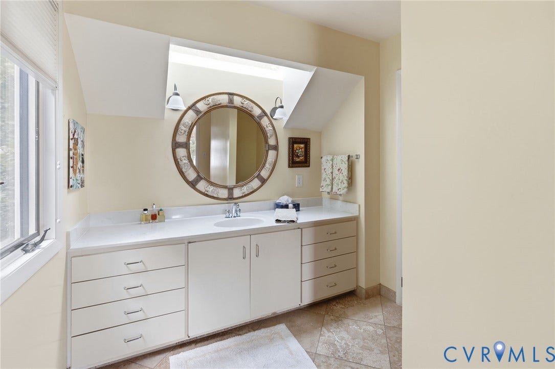 3416 Walkers Ferry Road, Walkers Ferry, Midlothian, VA 23112 Bathroom featuring a white vanity with an integrated sink, polished chrome faucet, and ample storage drawers